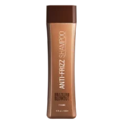 A 12 ounce brown bottle of Brazilian Blowout Anti-Frizzle Shampoo against a transparent background.