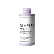 Close-up of a purple bottle with a white label that says Olaplex Number 8 Blend Enhancer Toning Shampoo.