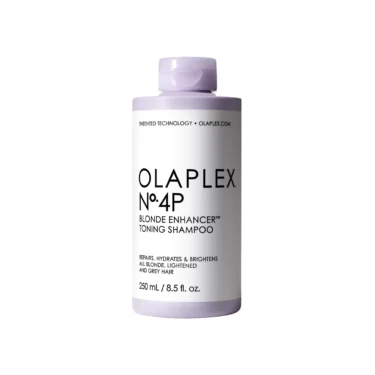 Close-up of a purple bottle with a white label that says Olaplex Number 8 Blend Enhancer Toning Shampoo.